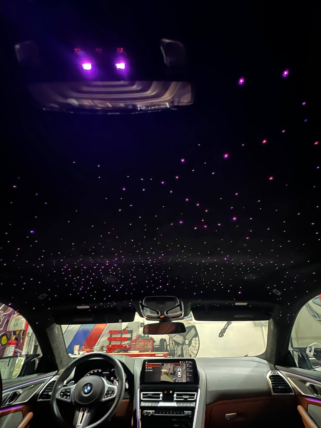 Purple starlight on interior of roof in BMW